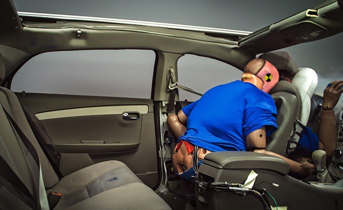 crash test dummy in back seat