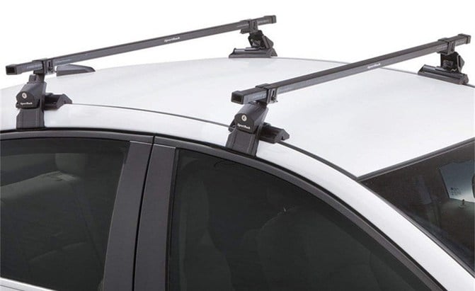 Sportrack roof rack clamped onto a sedan roof