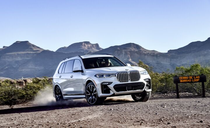 2019 BMW X7 M50i in white driving on dirt