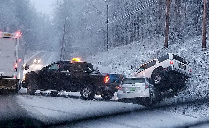 An accident in snowy conditions due to bad tires