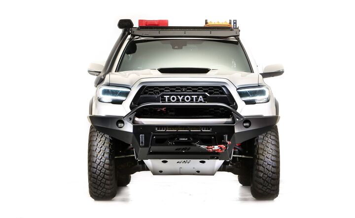 Most of the stock suspension on this Toyota Tacoma SEMA360 build was binned, replaced with ToyTec BOSS Aluma 2.5 Series coilovers, shocks, and add-a-leaf package.