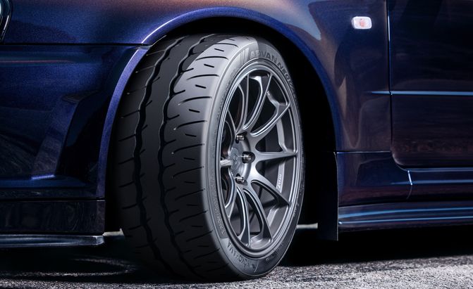 Tire and rim in car wheel arch