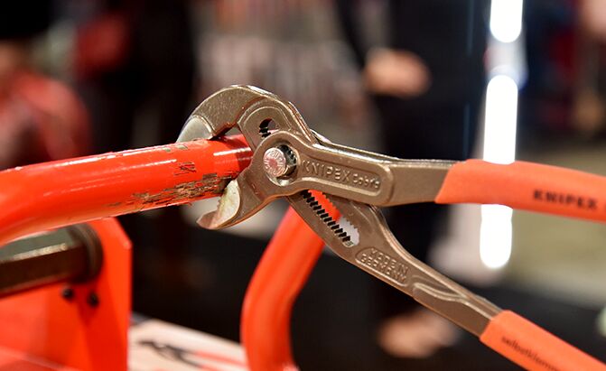 knipex pliers clamped on to a bar at SEMA 2022